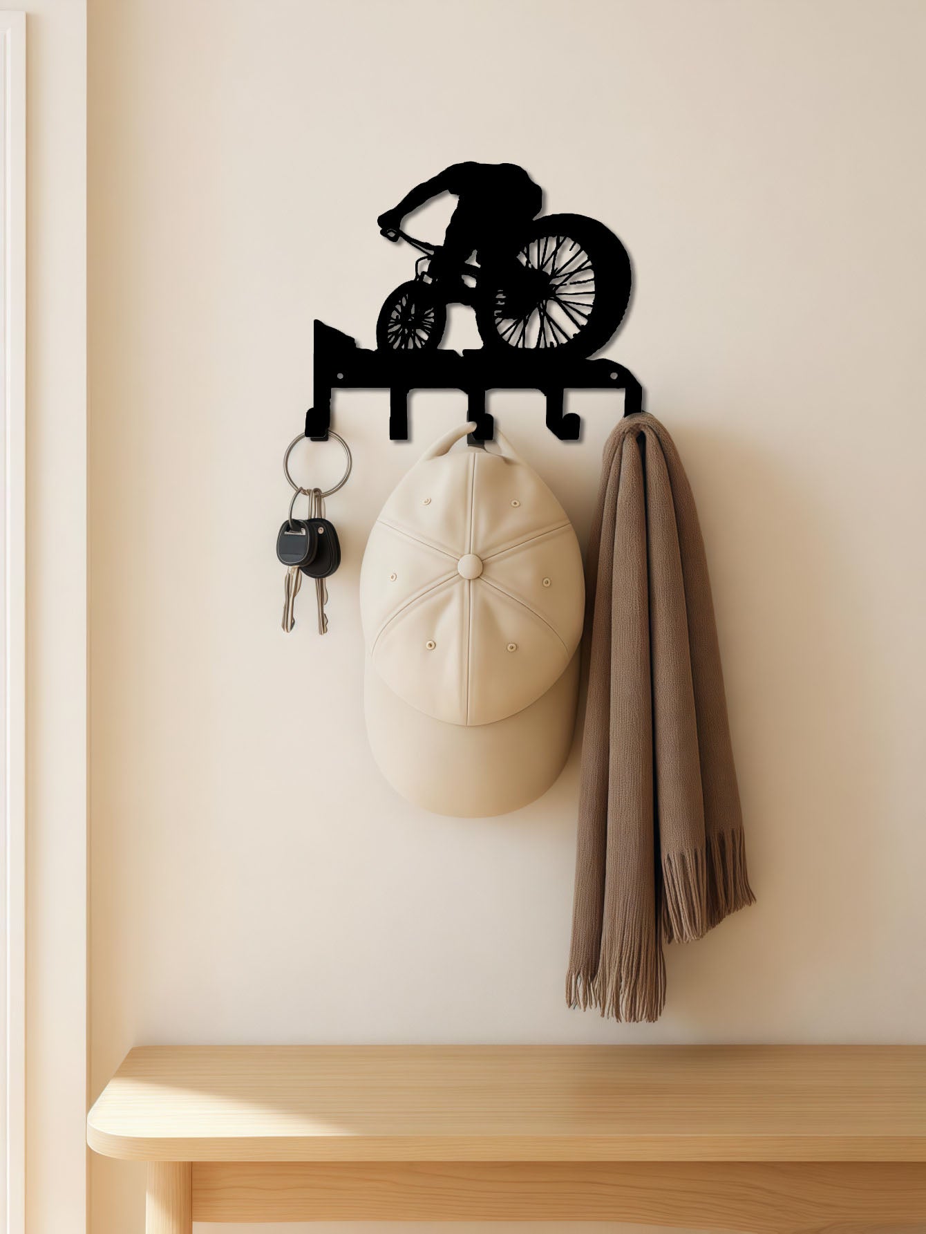 Elegant metal wall art with an integrated coat hook